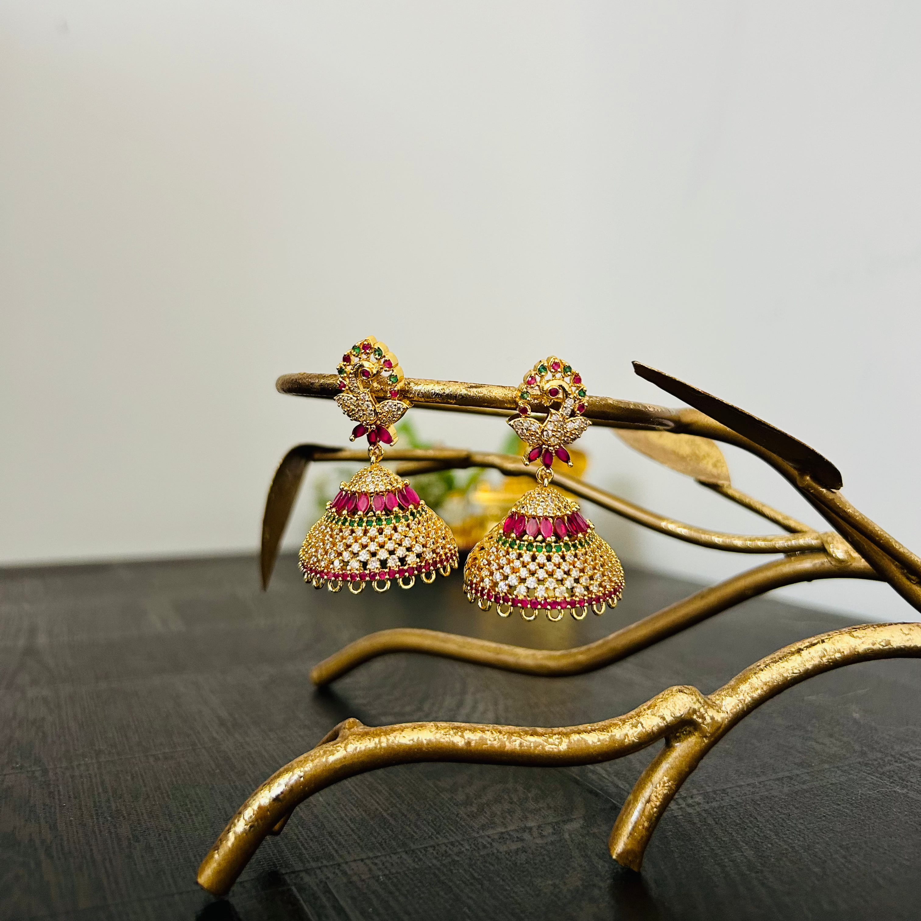 Jhumka Earrings in Microgold Finish